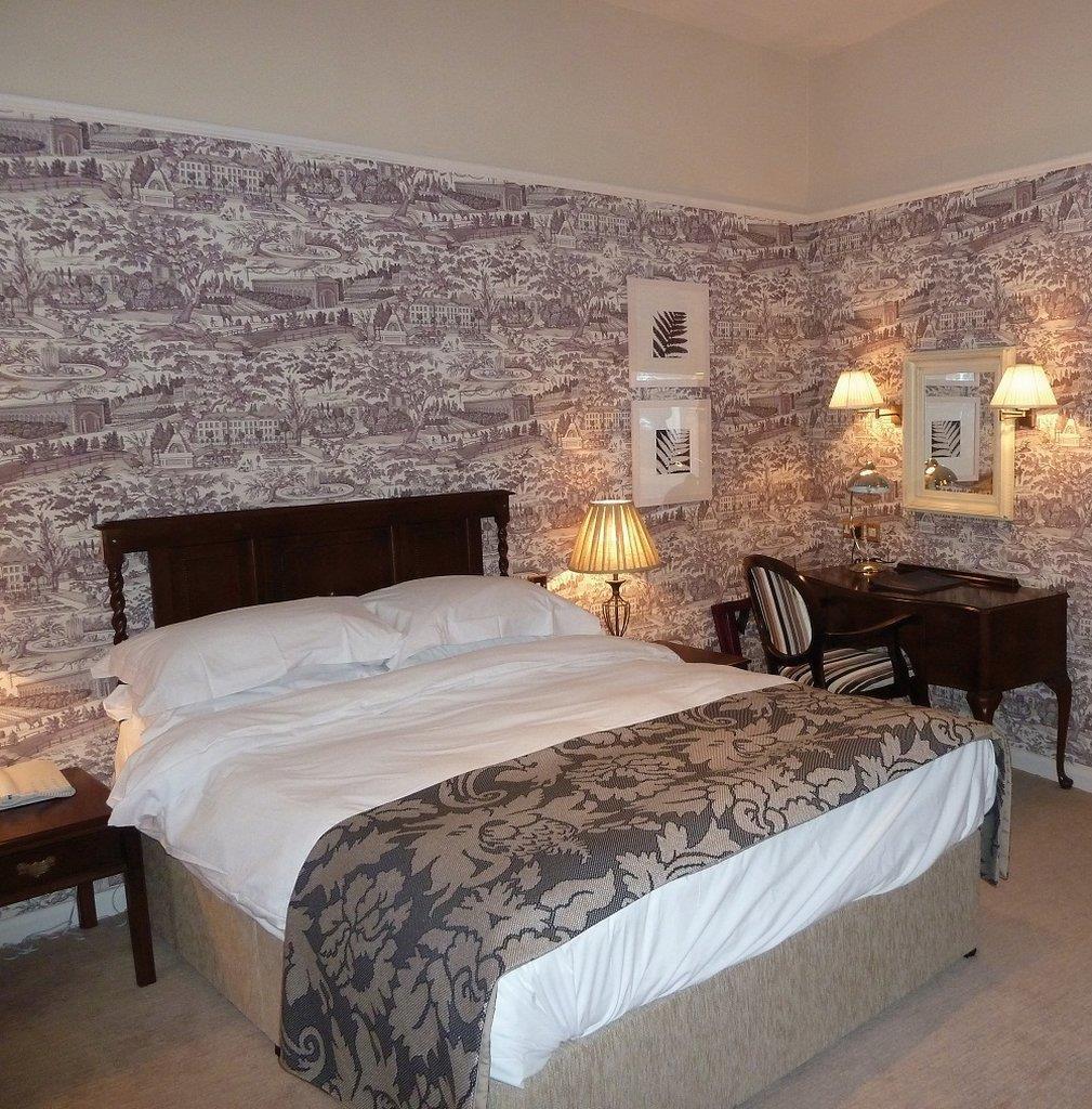 The Fleece At ไซเร็นเซสเตอร์ ห้อง รูปภาพ A bedroom at the hotel