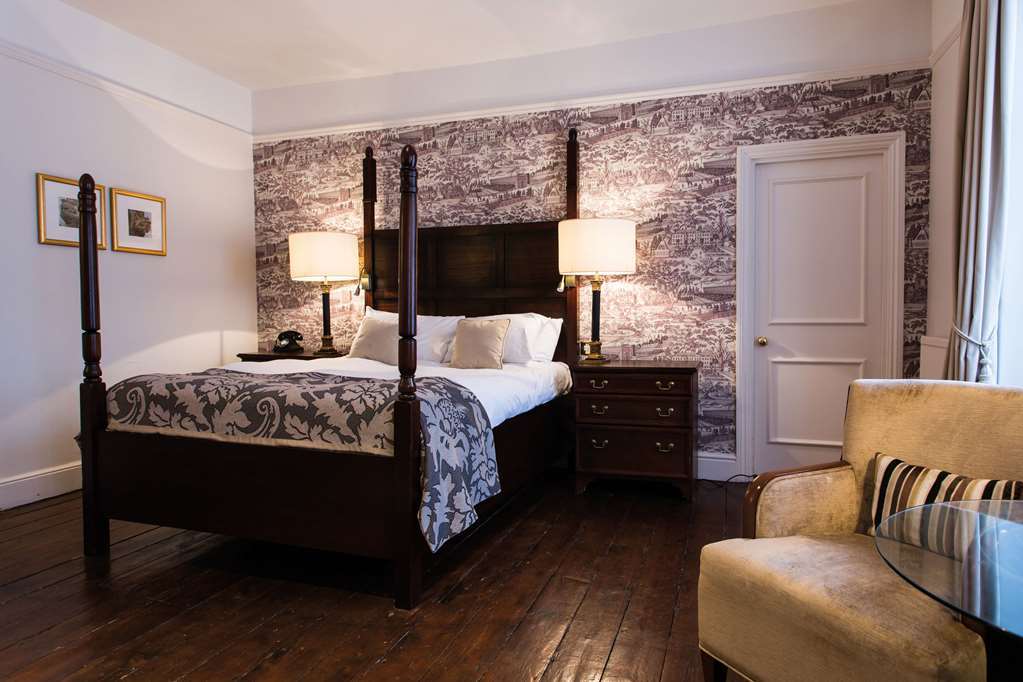 The Fleece At ไซเร็นเซสเตอร์ ห้อง รูปภาพ A bedroom at the hotel