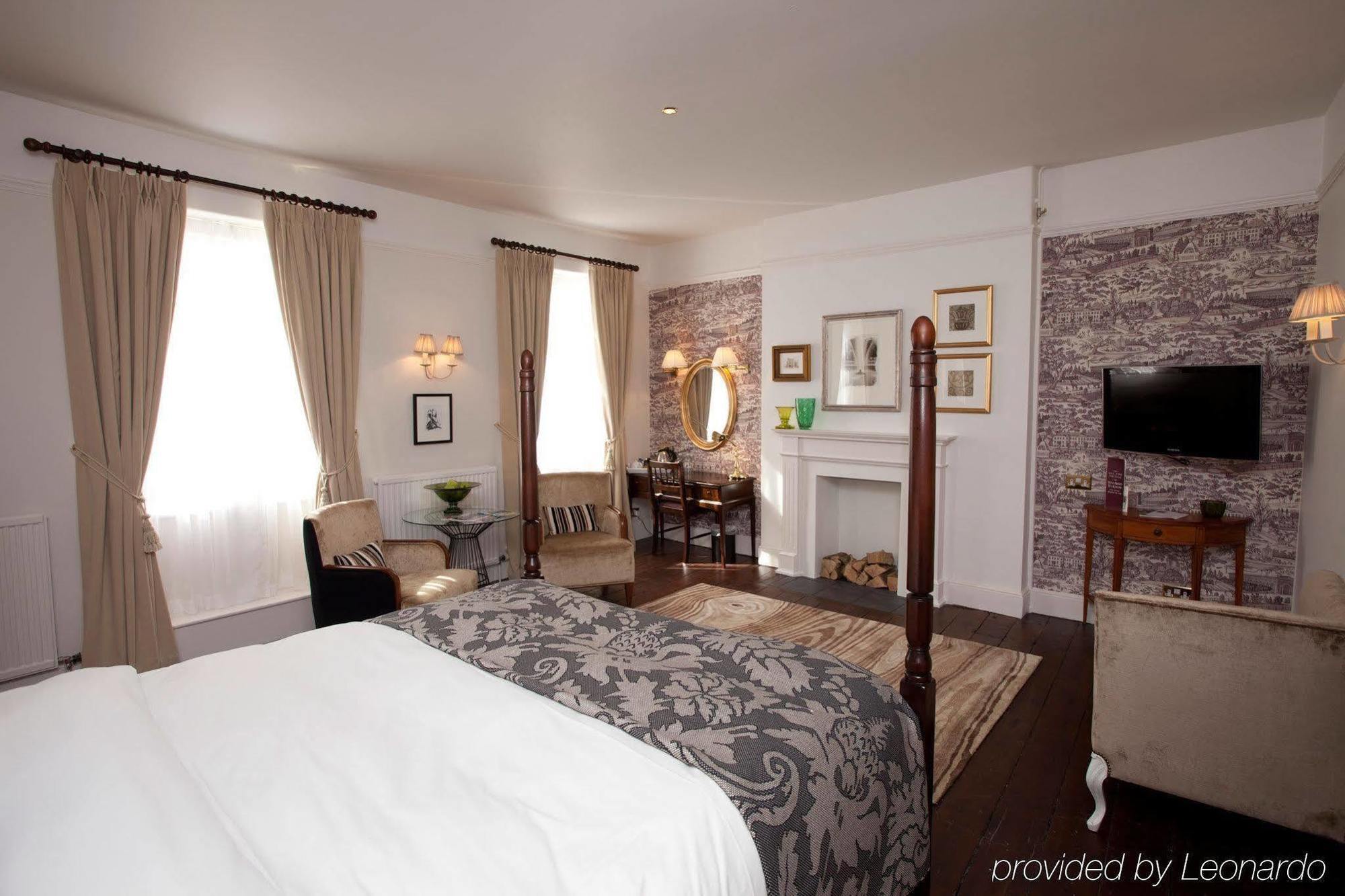 The Fleece At ไซเร็นเซสเตอร์ ห้อง รูปภาพ A room at the hotel