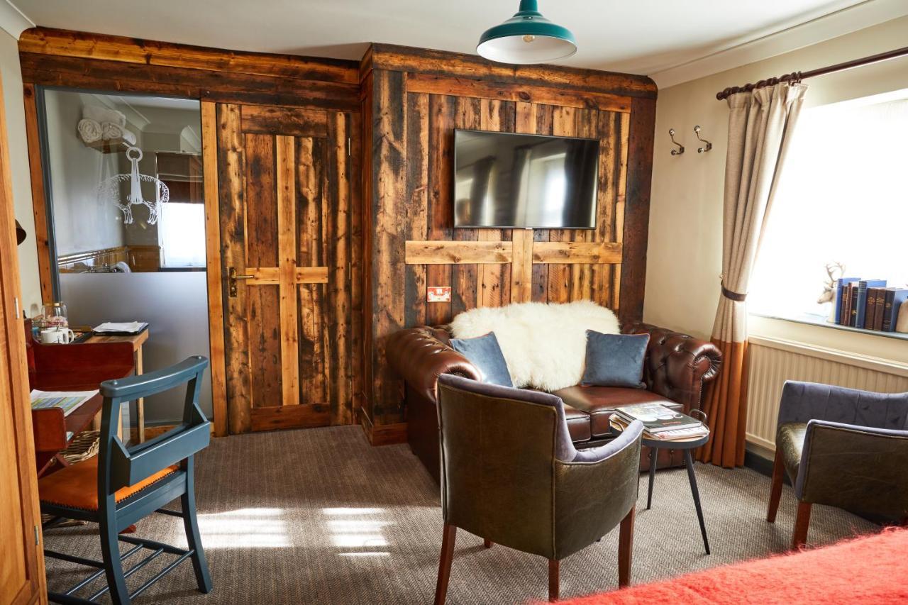 The Fleece At ไซเร็นเซสเตอร์ ภายนอก รูปภาพ The interior of the stable